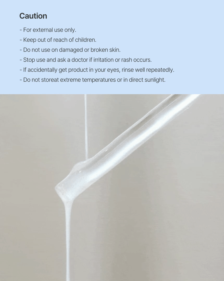 Close-up dropper dispensing clear serum—Niacinamide 15 texture